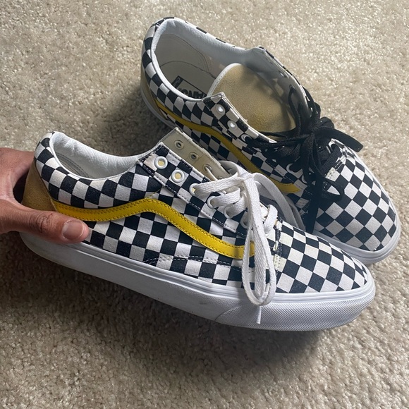 checkerboard vans with yellow stripe